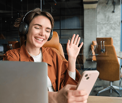 A girl on video call with headphones on